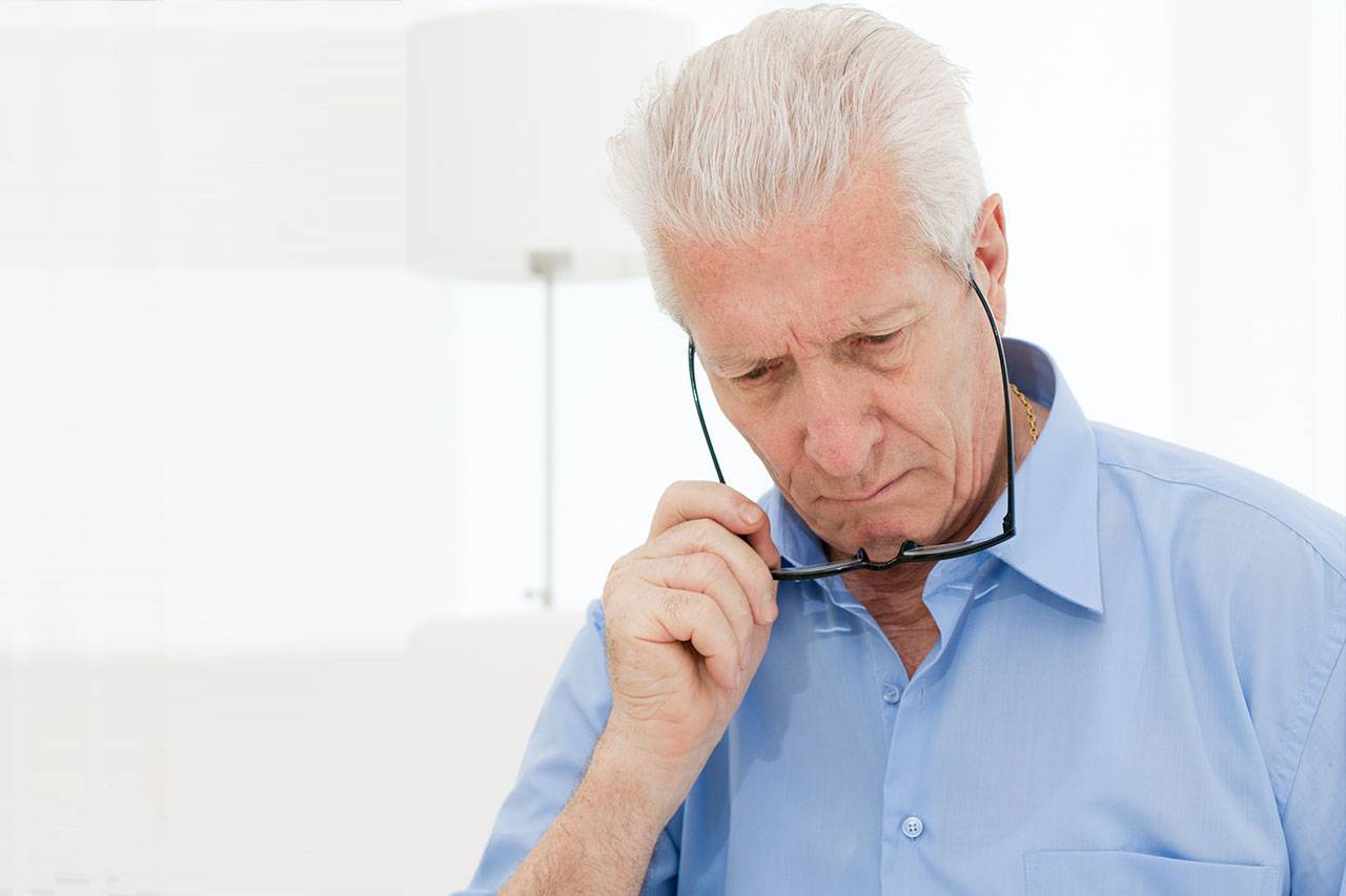 Older Man with Low Vision, Struggling To Read